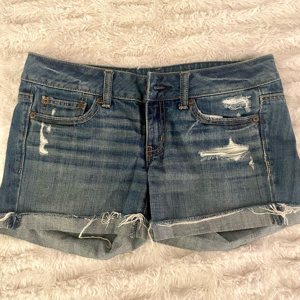 American Eagle low waisted distressed jean shorts